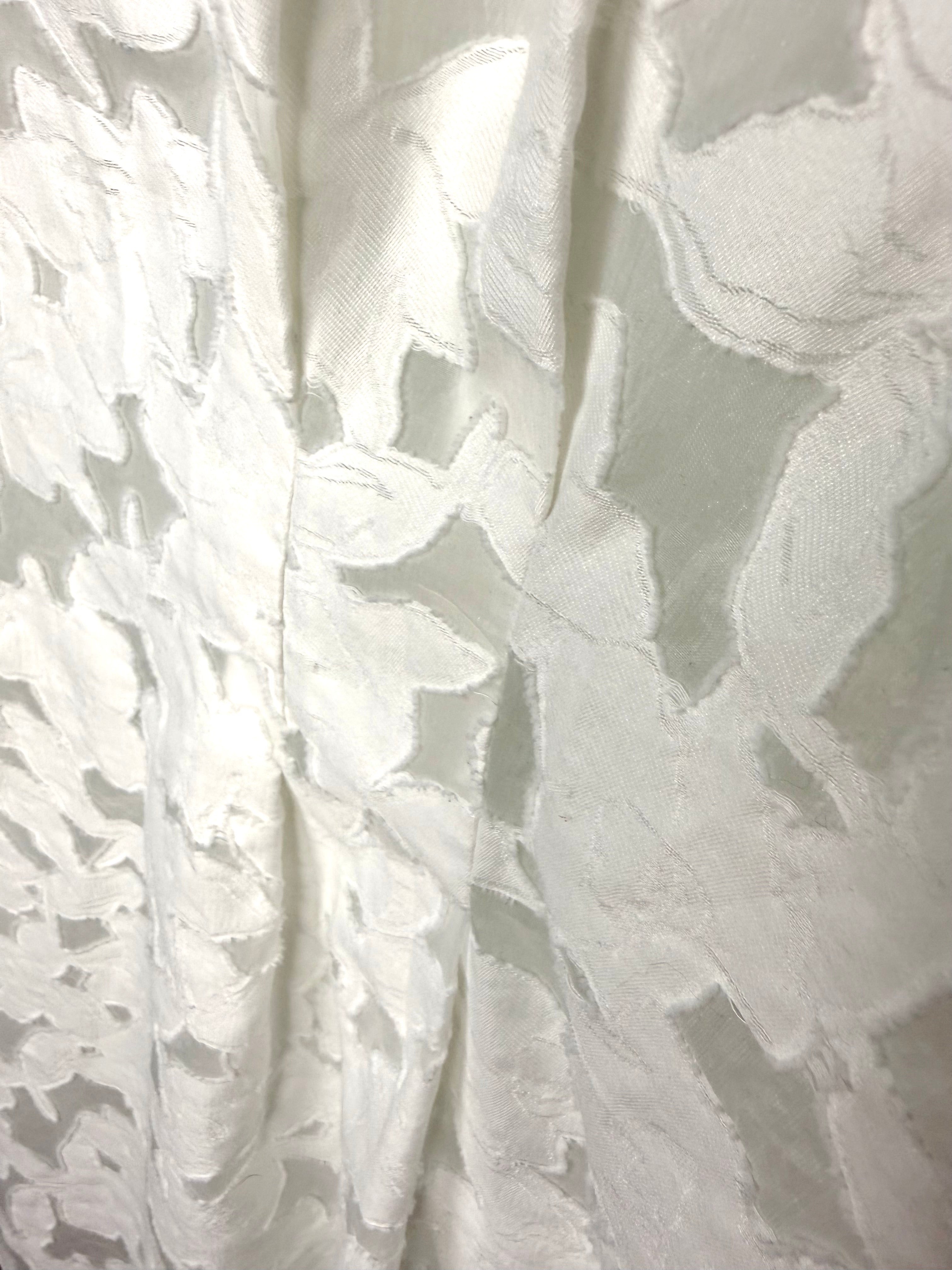 close up of pattern on Club Monaco white burnout shirt dress with brocade pattern 