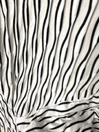 close up of pattern on Habitat Striped Tunic Top Black and White Abstract Hem Habitat top resale 