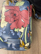 close up of pattern on Sakroots Floral Crossbody Phone Wallet 