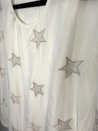 close up of star pattern on Tendenze made in italy star print overlay top