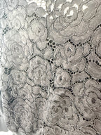 close up view of 60's style Karl Lagerfeld Paris black knit cardigan lace on back