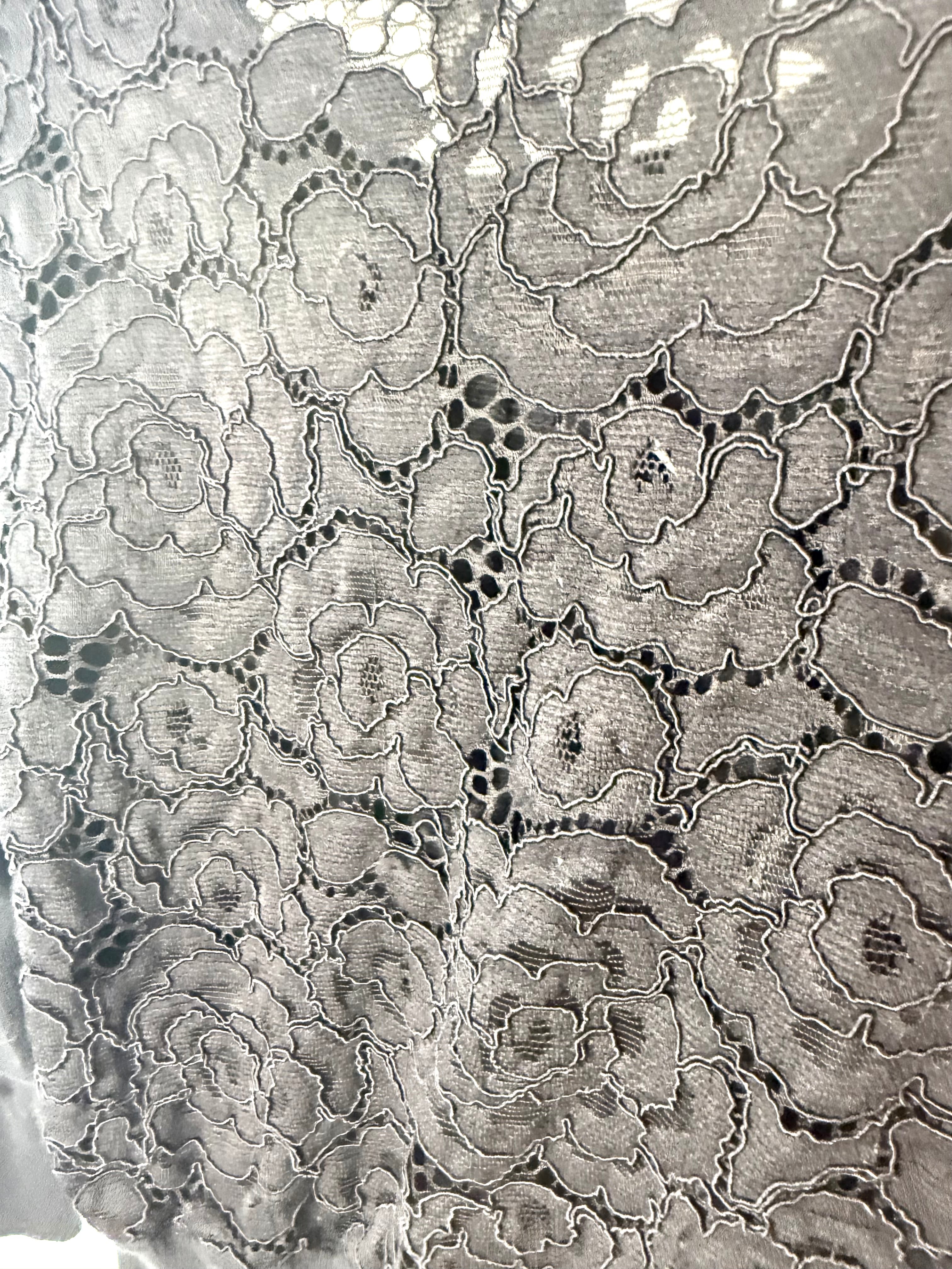 close up view of 60's style Karl Lagerfeld Paris black knit cardigan lace on back