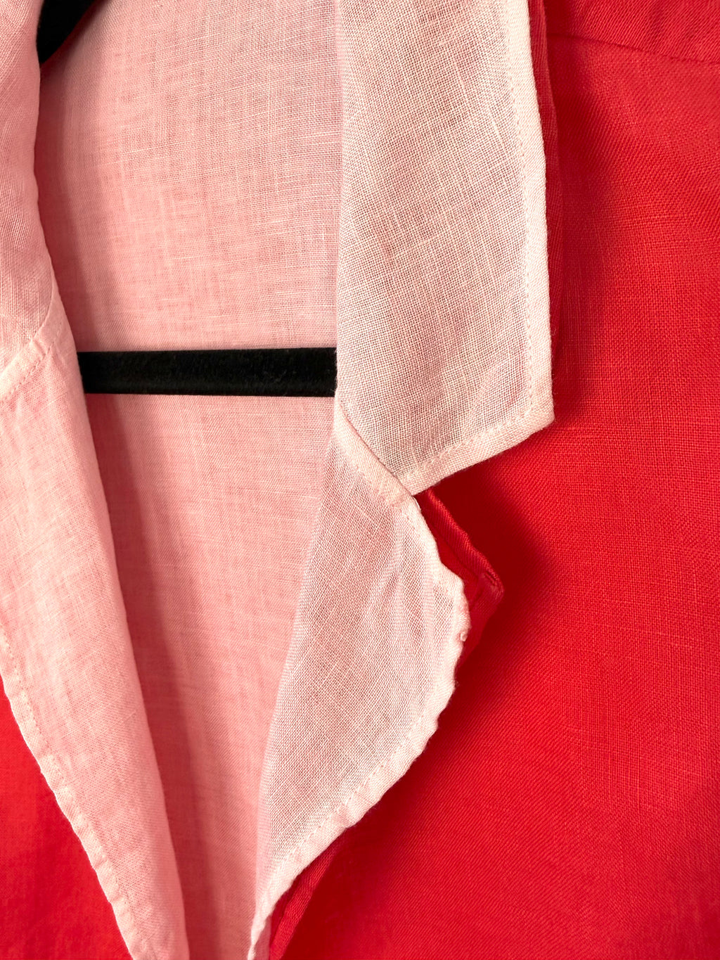 collar detail on reversible statement hot pink jacket modern minimalist style
