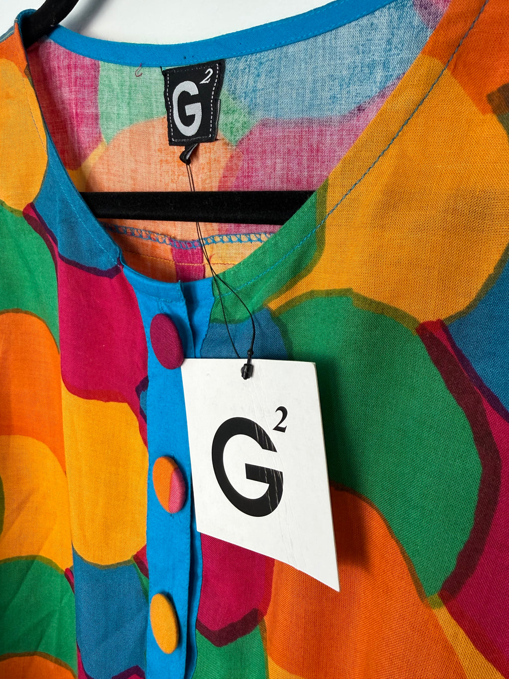 colourful abstract statement top or dress with covered buttons