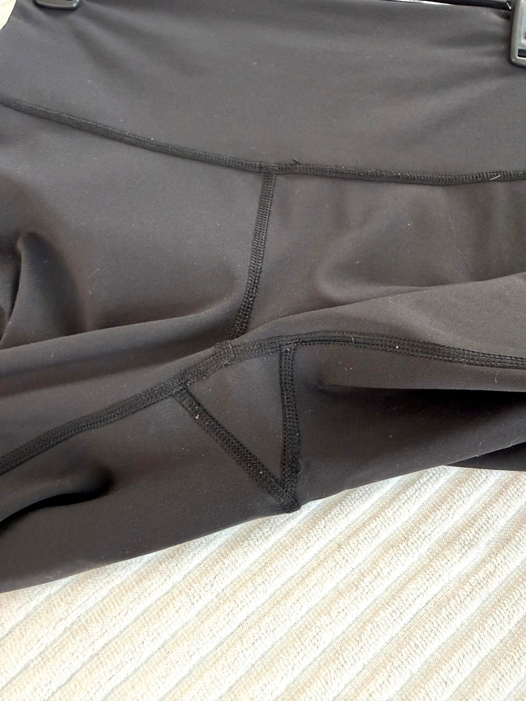 crotch of Pre-loved Lululemon Black High Waisted Leggings | Size 6 at Blue Sparrow Shop
