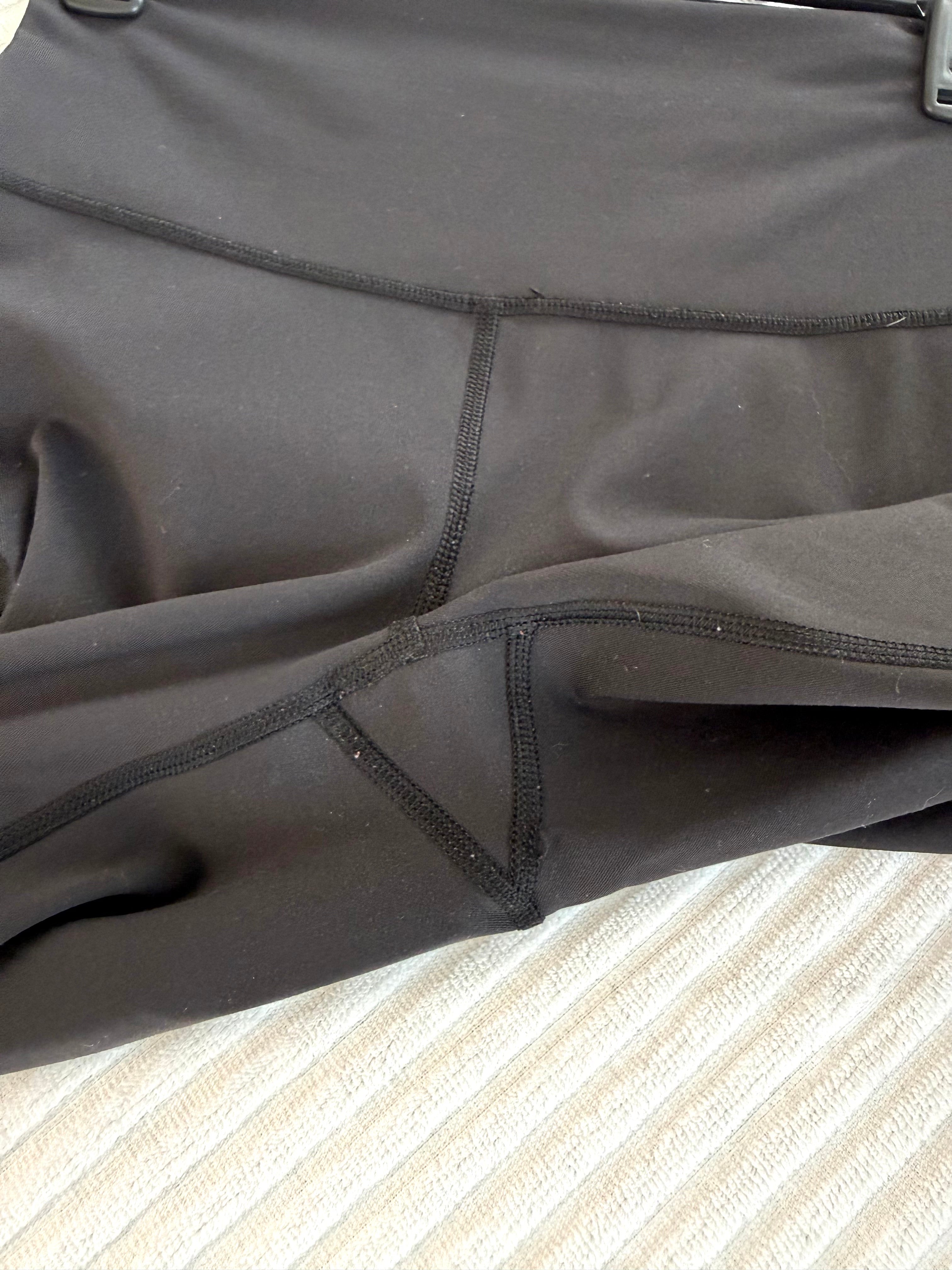 crotch of Pre-loved Lululemon Black High Waisted Leggings | Size 6 at Blue Sparrow Shop