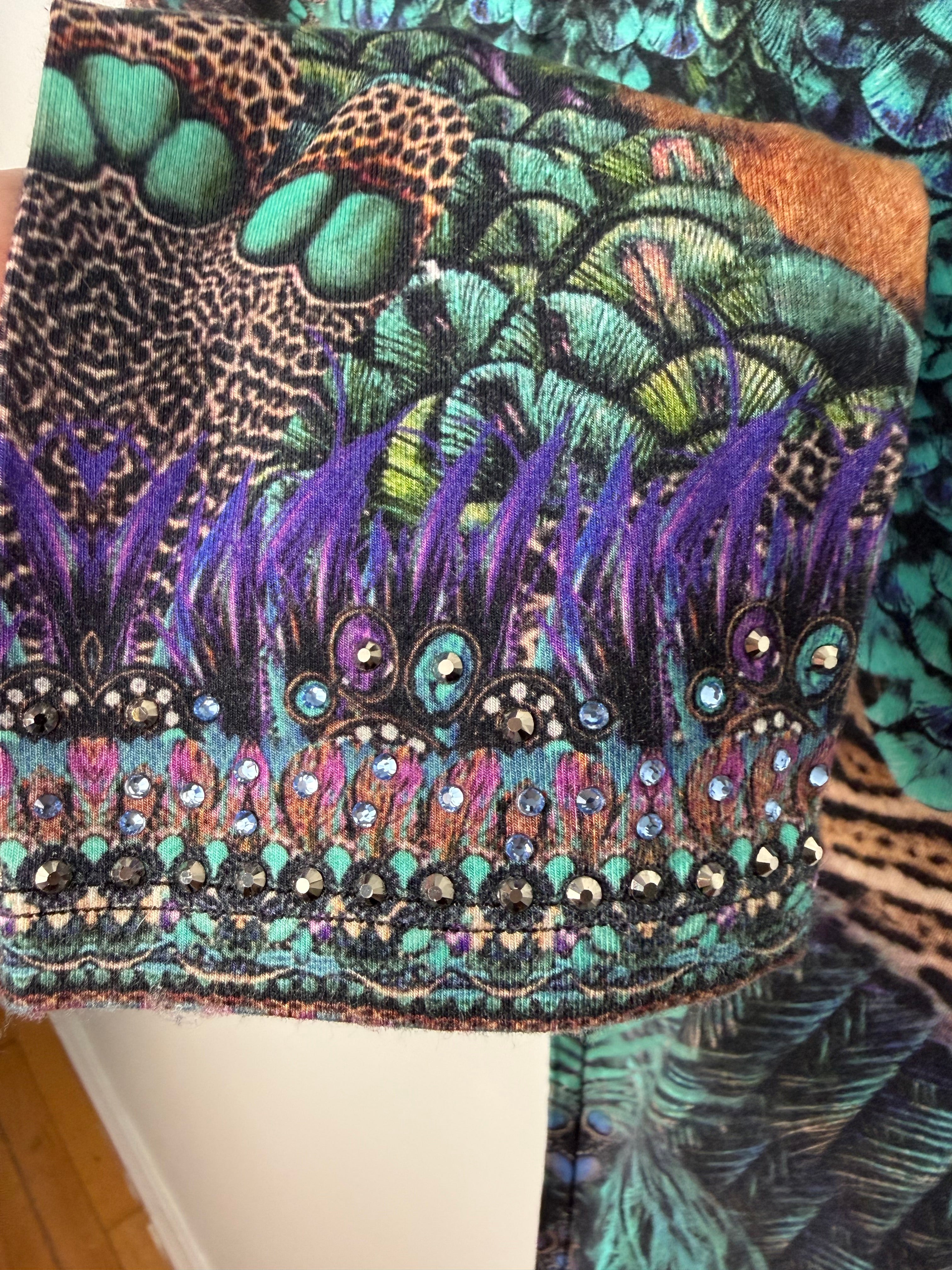 Luxury Camilla Franks resort wear leggings featuring a vibrant animal print design with crystal embellished ankle detailing. cuff detail 