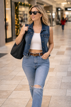 Dark Wash Denim Vest | Size M on woman in mall at Blue Sparrow Shop