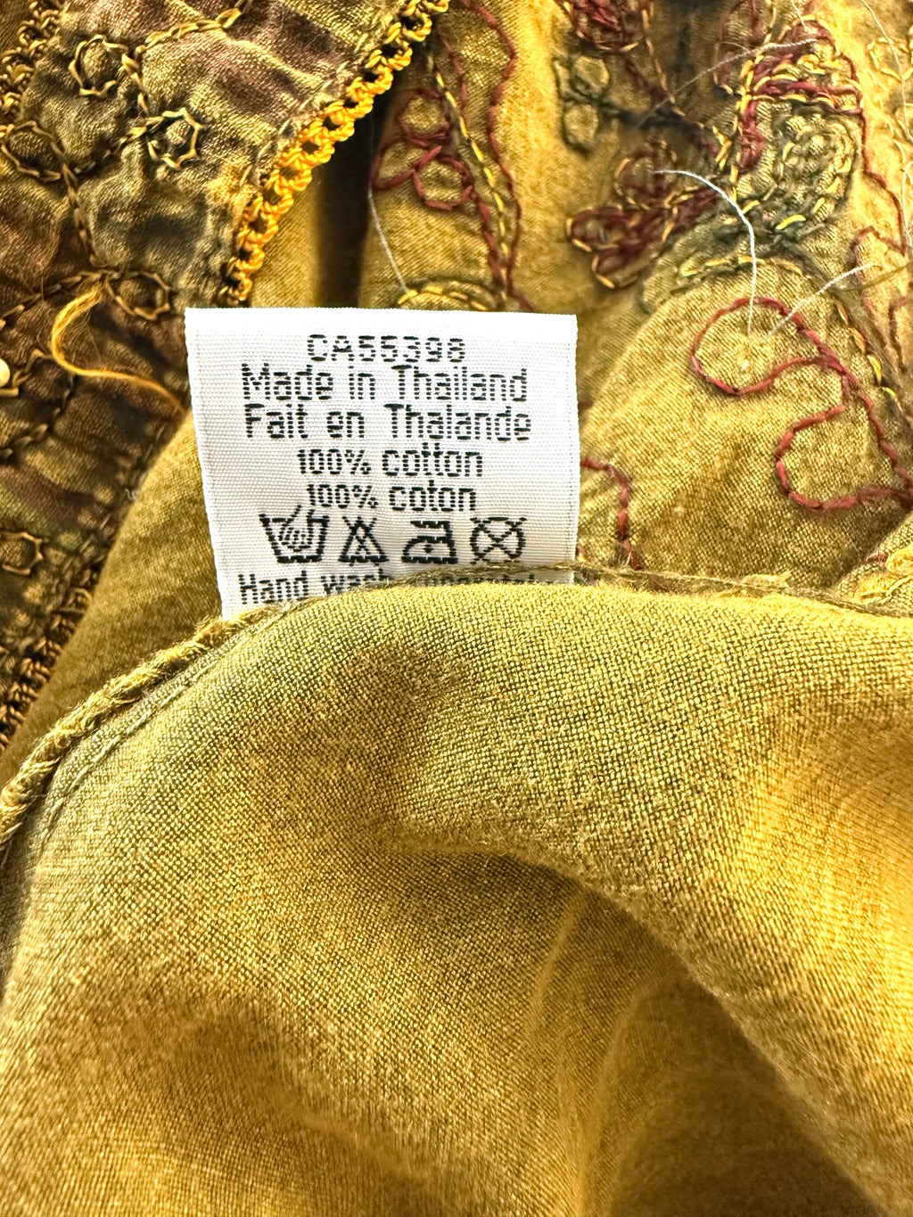 fabric tag inside 100% Cotton Artisan Embroidered Sequin Tunic — Washed Mustard Gold | Boho Festival Top | Est. Small at Blue Sparrow Shop