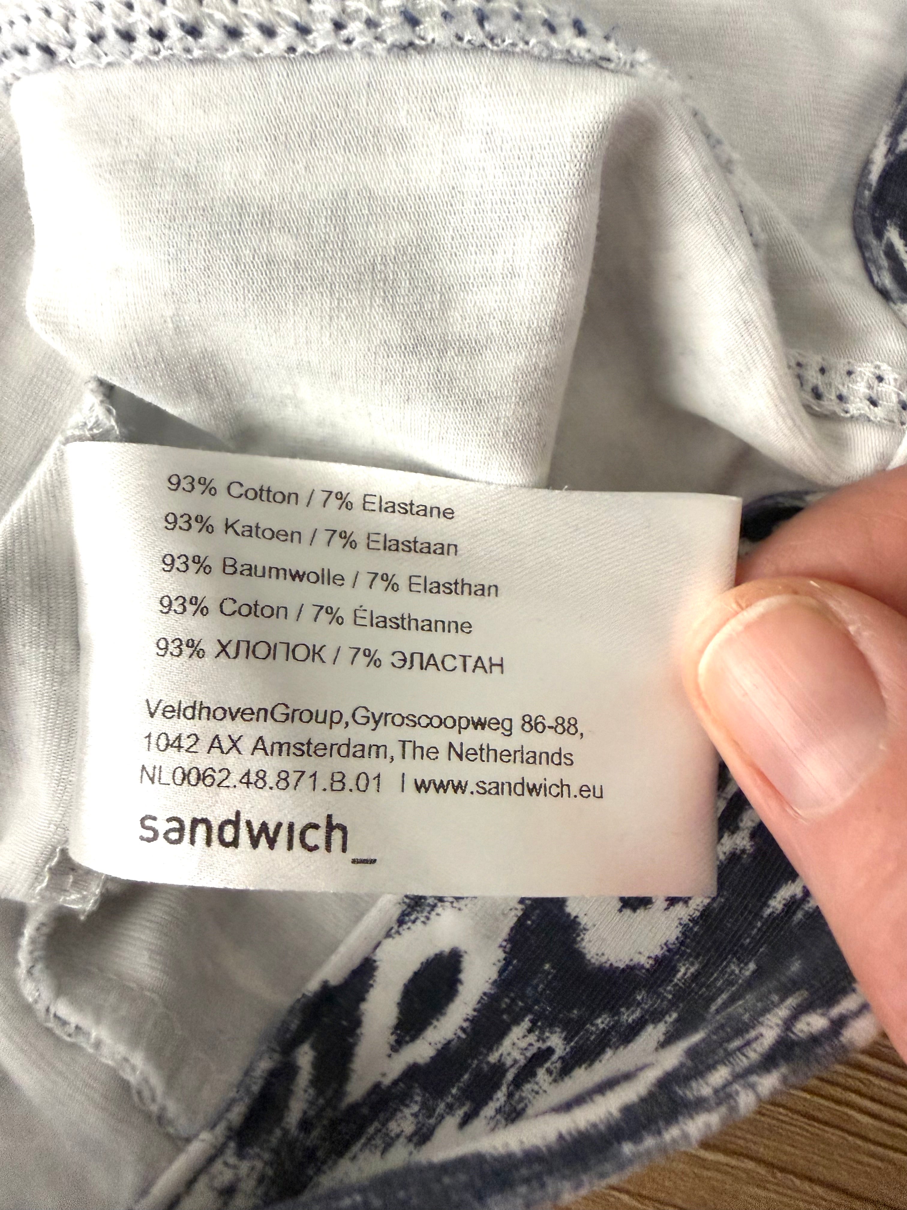 fabric tag inside Sandwich brand denim and white jacket