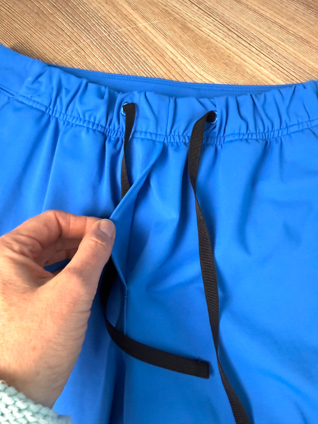 fake zip on front of Lululemon Cobalt Blue Tapered Drawstring Pant, Size 8 | Blue Sparrow Resale Reimagined