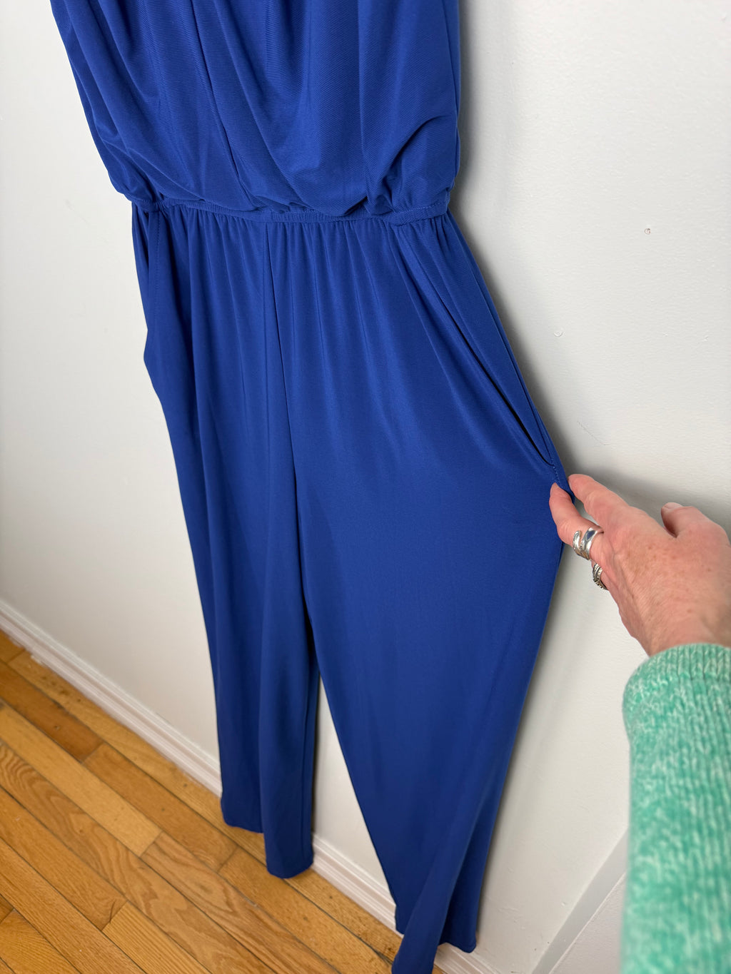 flow of Emma & Michele cobalt blue sleeveless draped pleated bodice jumpsuit at Blue Sparrow Shop