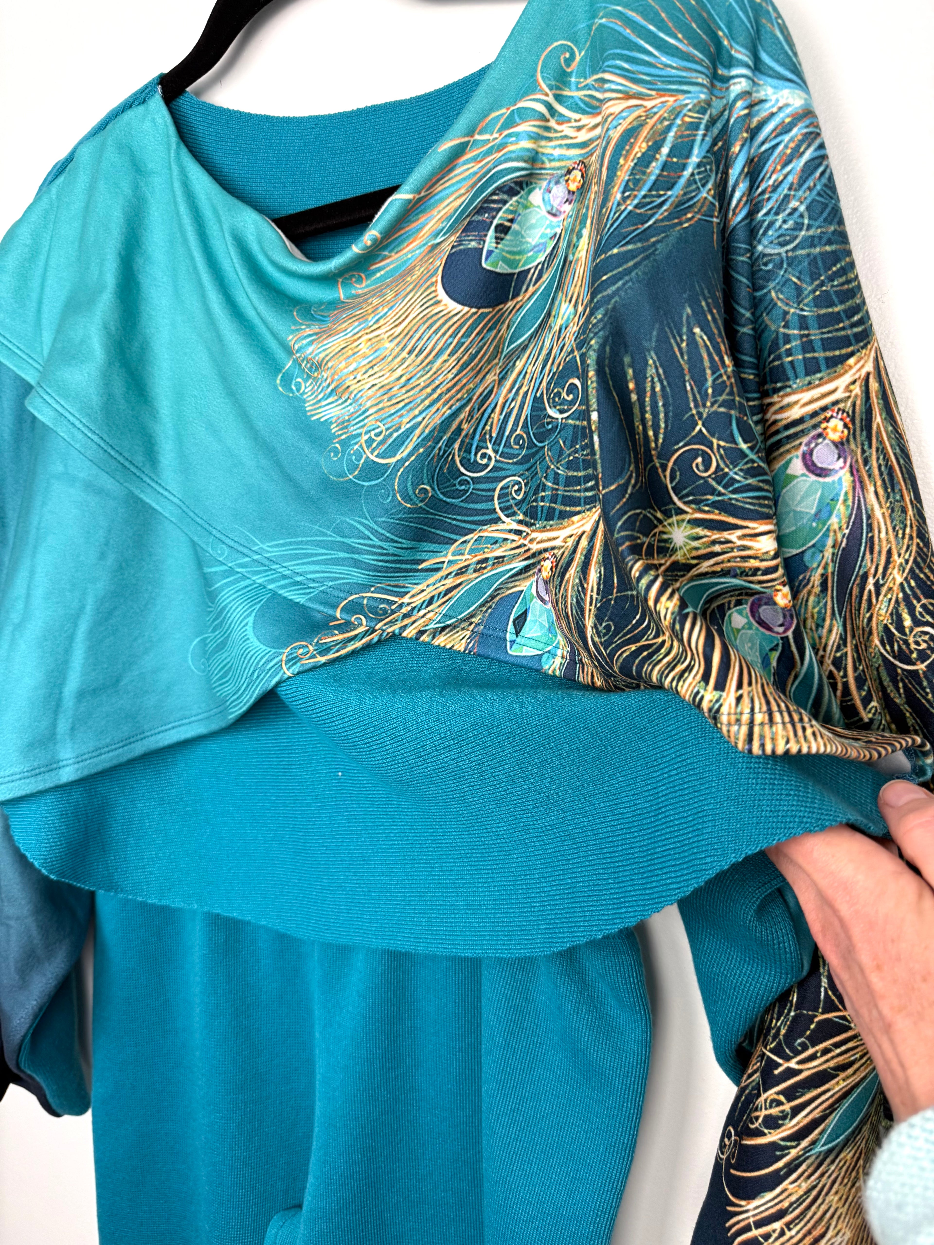 flow of cropped knit top with peacock front on Teal Peacock Print 2-Piece Knit Set — Wide-Leg Pants + Draped Top, Size XL at Blue Sparrow Shop