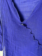 front button detail on neckline of Red Coral Royal Blue Asymmetrical Tunic Top 