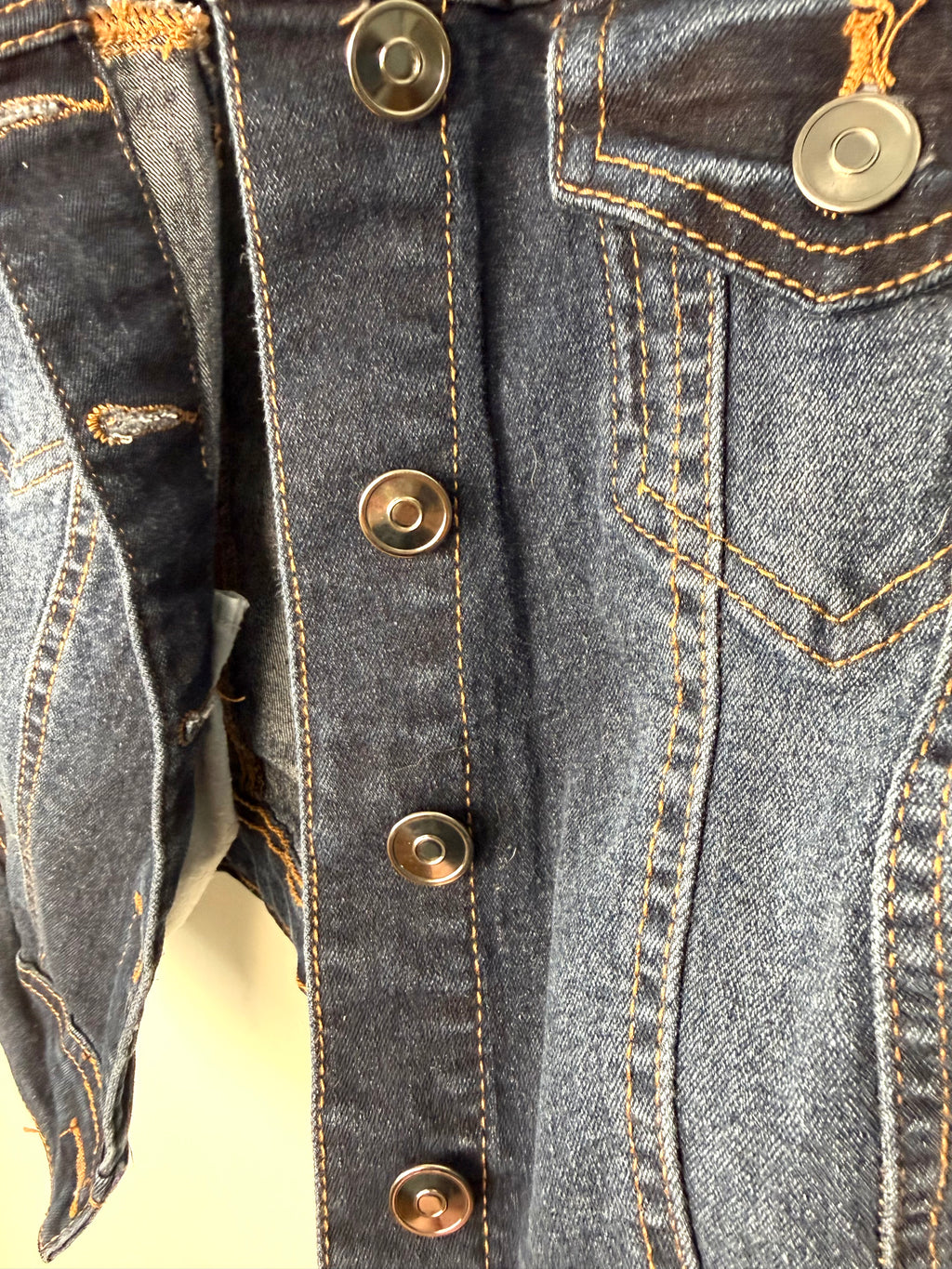 front button detail on Y2K denim vest 