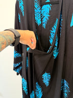 front crossover detail on Black & Turquoise Feather Print One-Size Wrap Kimono Jacket