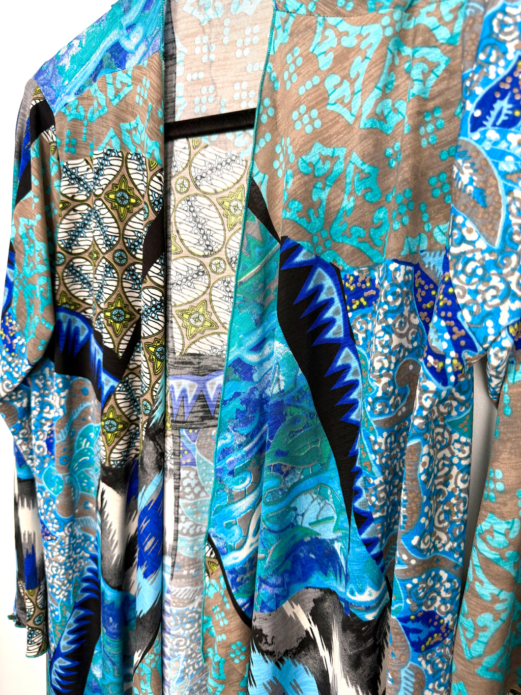 front drape on Judy Pannou Designs — Canadian Artisan Multi-Print Open Cardigan, Ashton ON  at Blue Sparrow Shop Canadian Resale Reimagined 