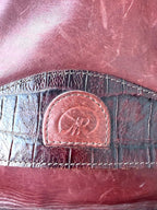 front embossed and croc logo on Vintage Rowland Leather Crossbody Bag circa 1970/1980