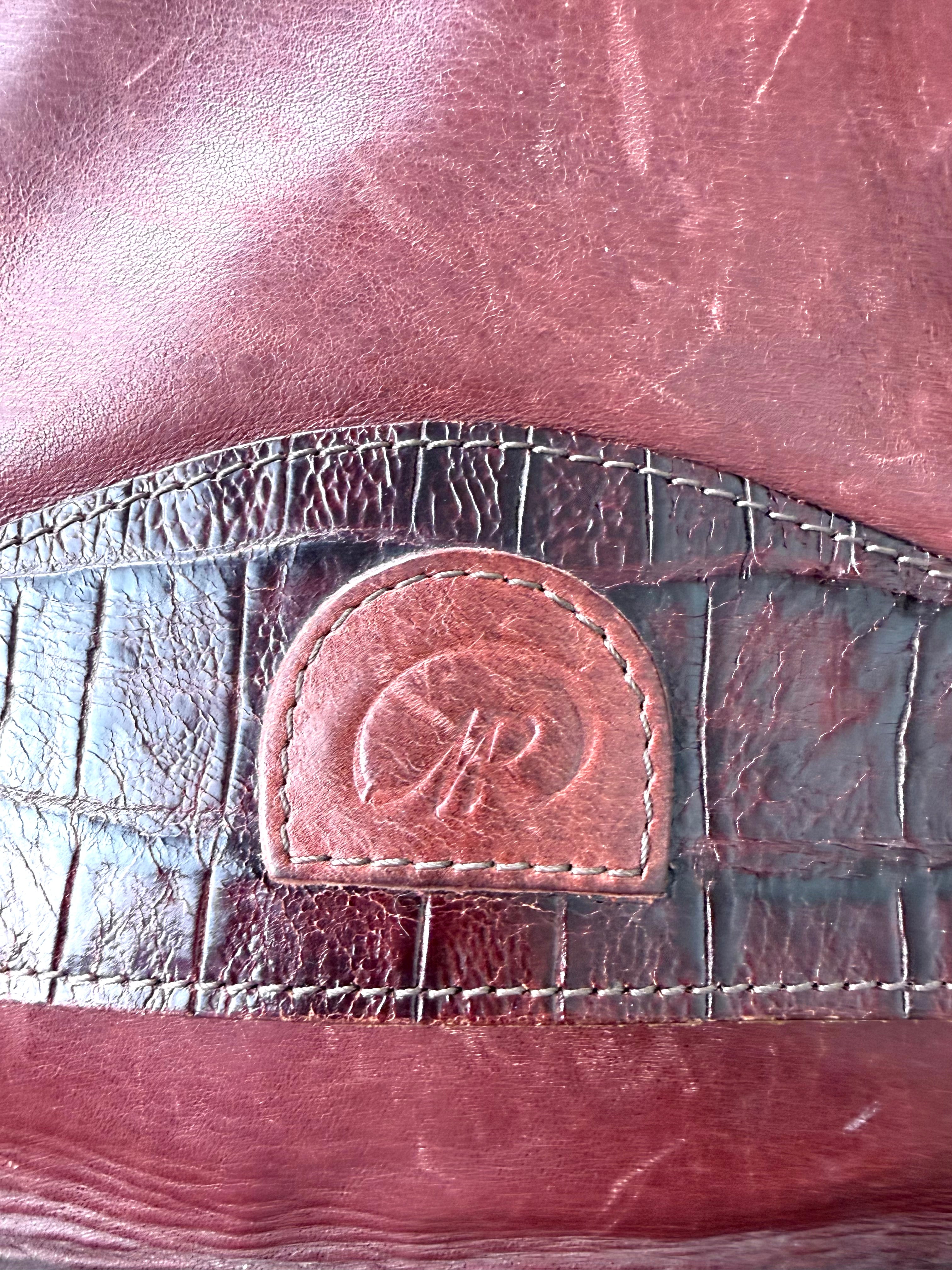 front embossed and croc logo on Vintage Rowland Leather Crossbody Bag circa 1970/1980