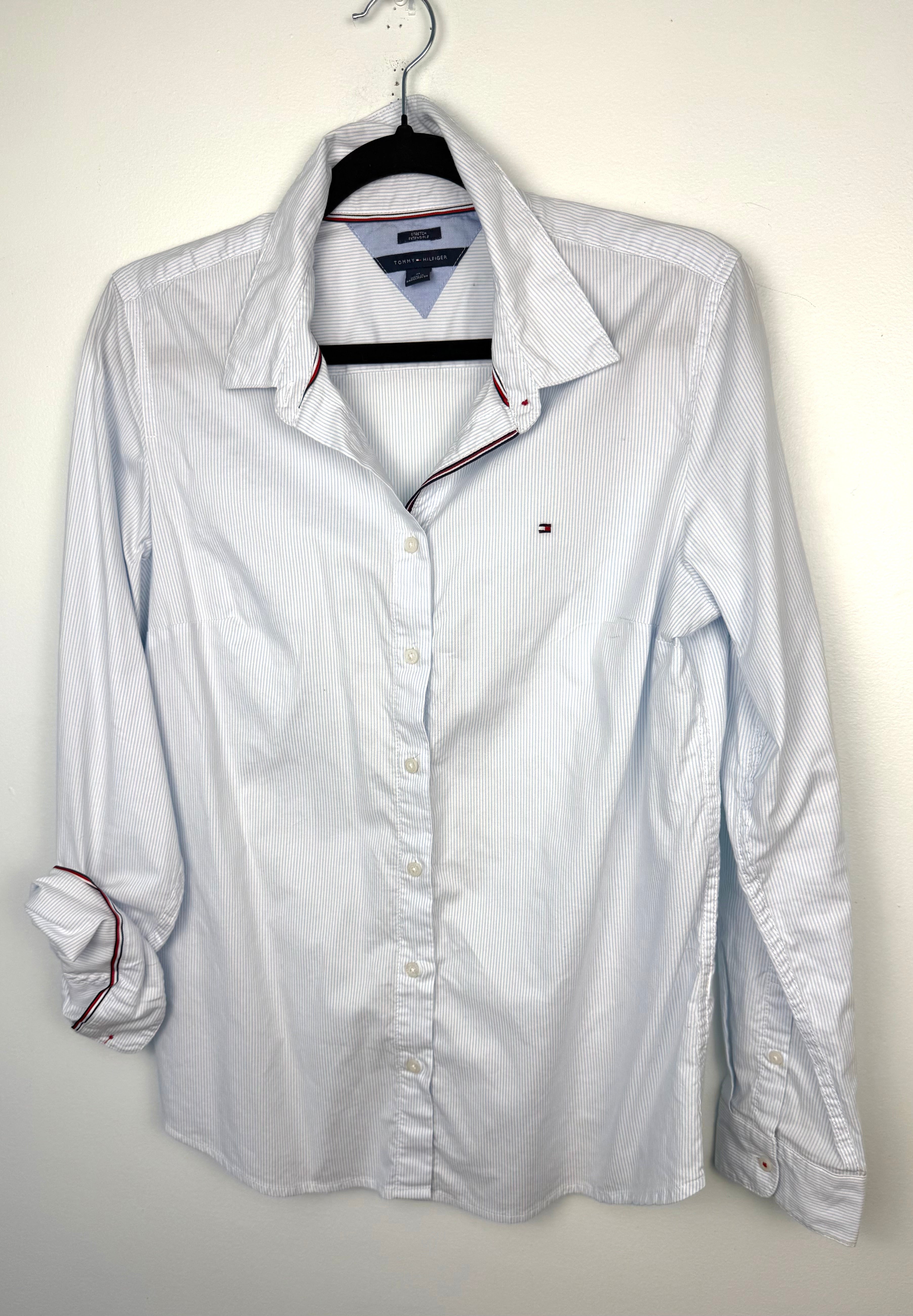 front of 100% Cotton Tommy Hilfiger Classic Button Front Shirt | Size M with one sleeve rolled