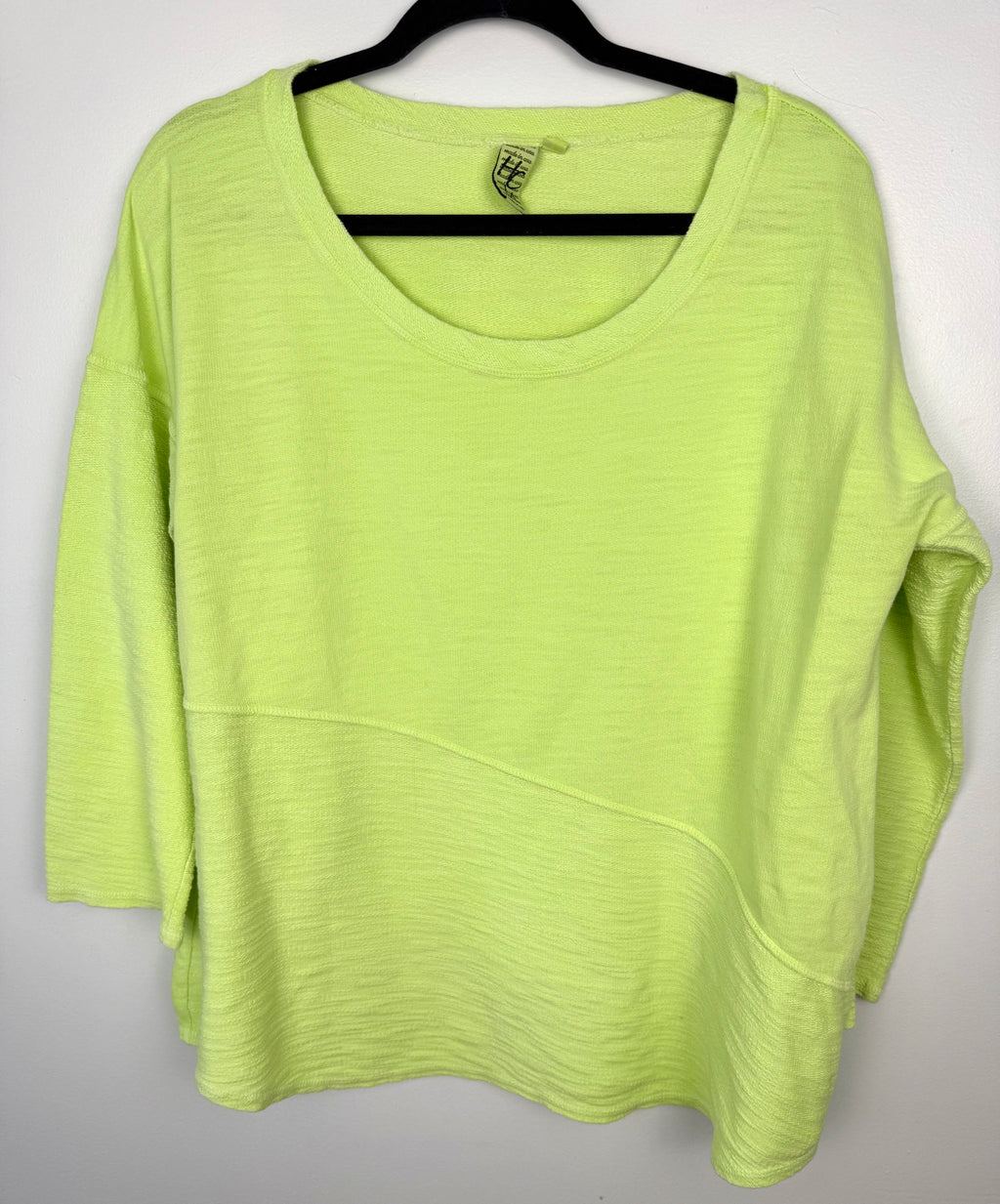 front of 100% cotton Made in USA lime/chartreuse green oversized boxy scoop neck top at Blue Sparrow Shop  on hanger
