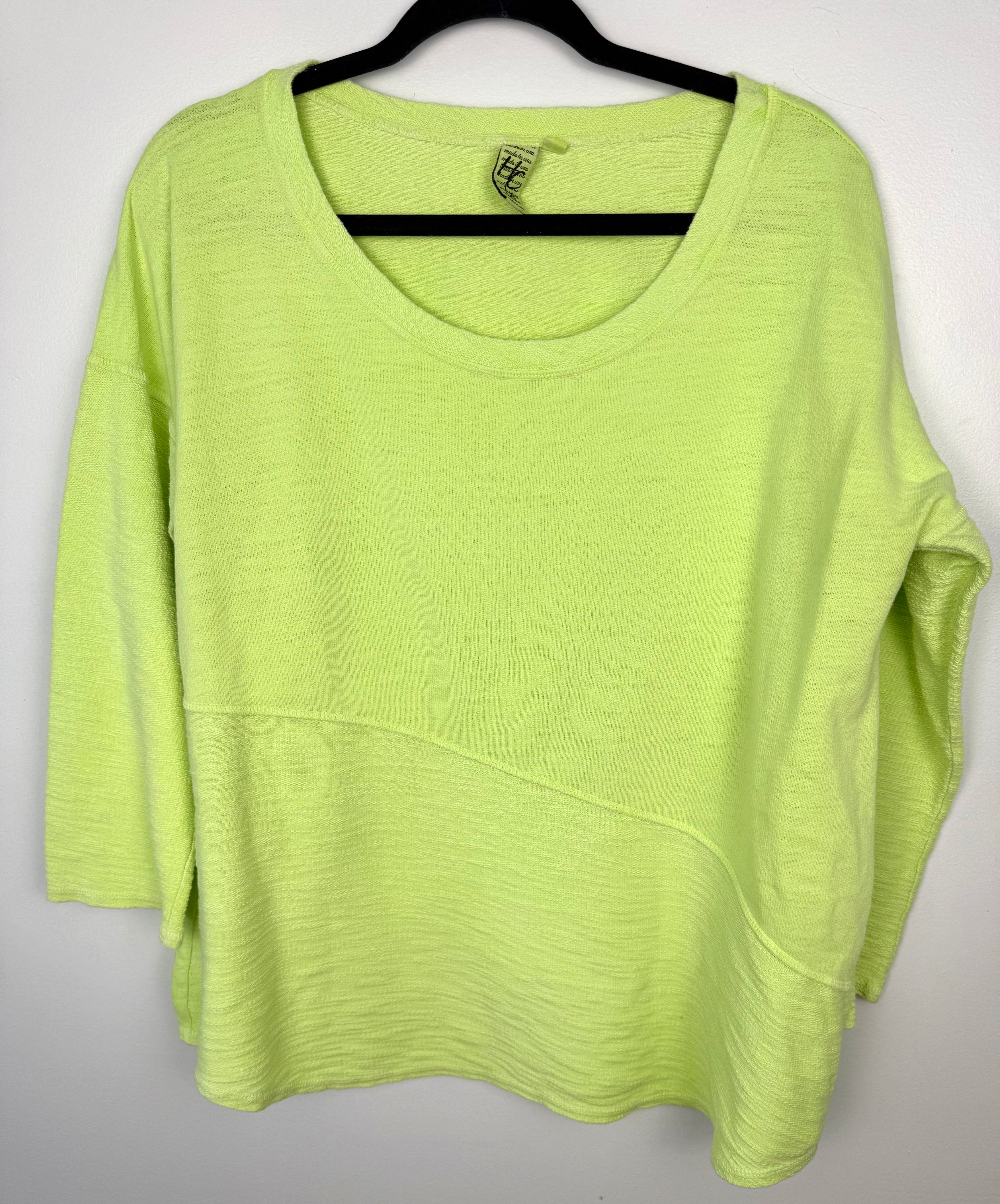 front of 100% cotton Made in USA lime/chartreuse green oversized boxy scoop neck top at Blue Sparrow Shop  on hanger