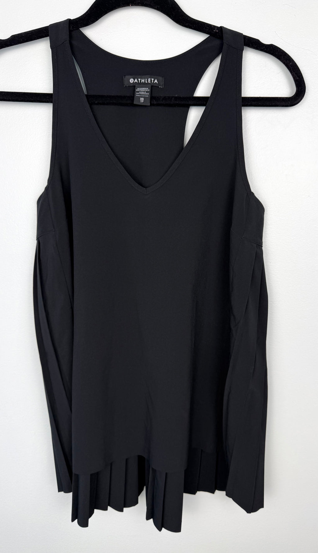 front of Athleta Black Pleated Flowy Tank Top at Blue Sparrow Shop  on hanger