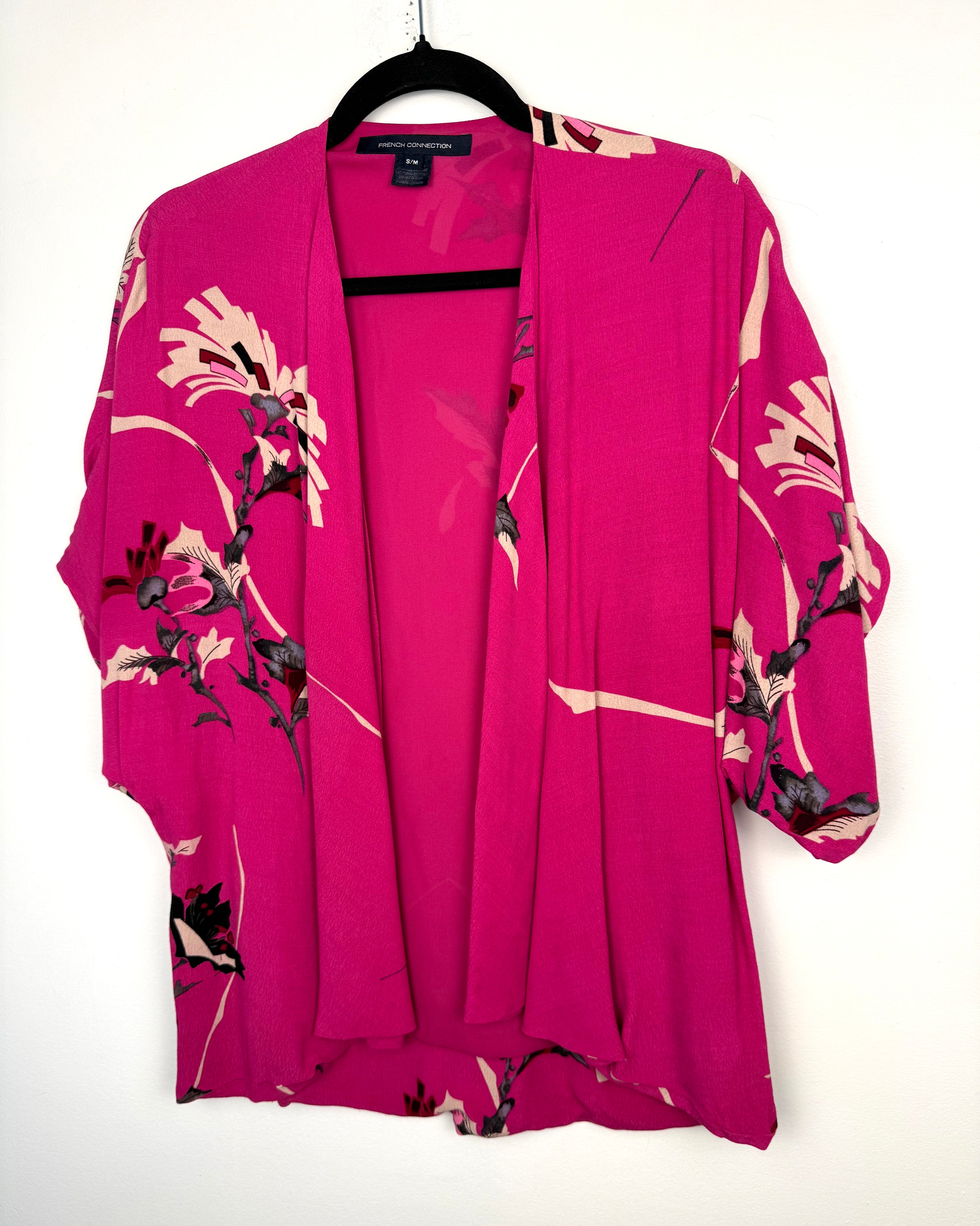 front of French Connection Floral Kimono | Romantic Boho Layering Piece at Blue Sparrow Shop on hanger