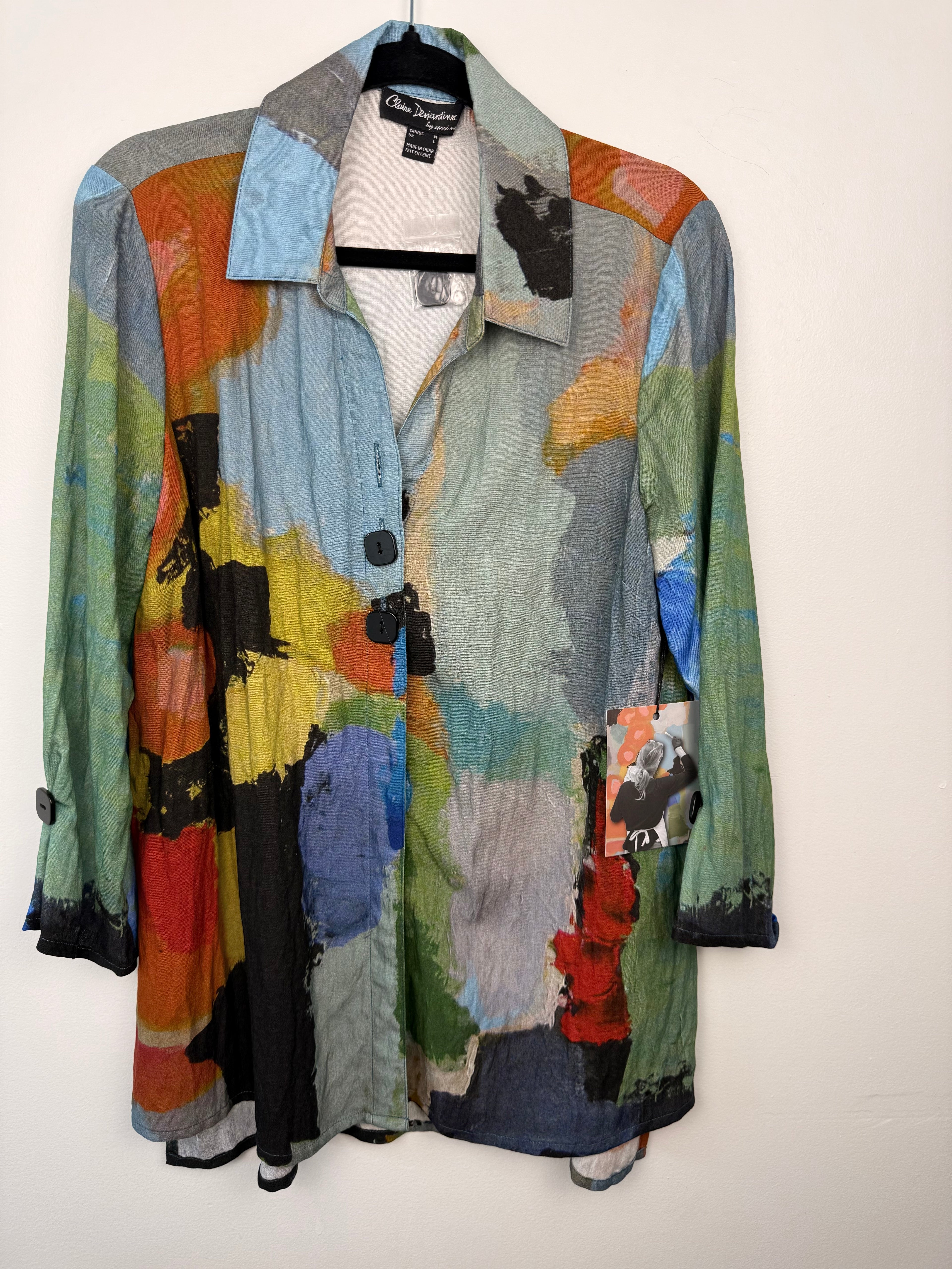 front of NWT Claire Desjardin 'In The City' Shirt | Size M on hanger