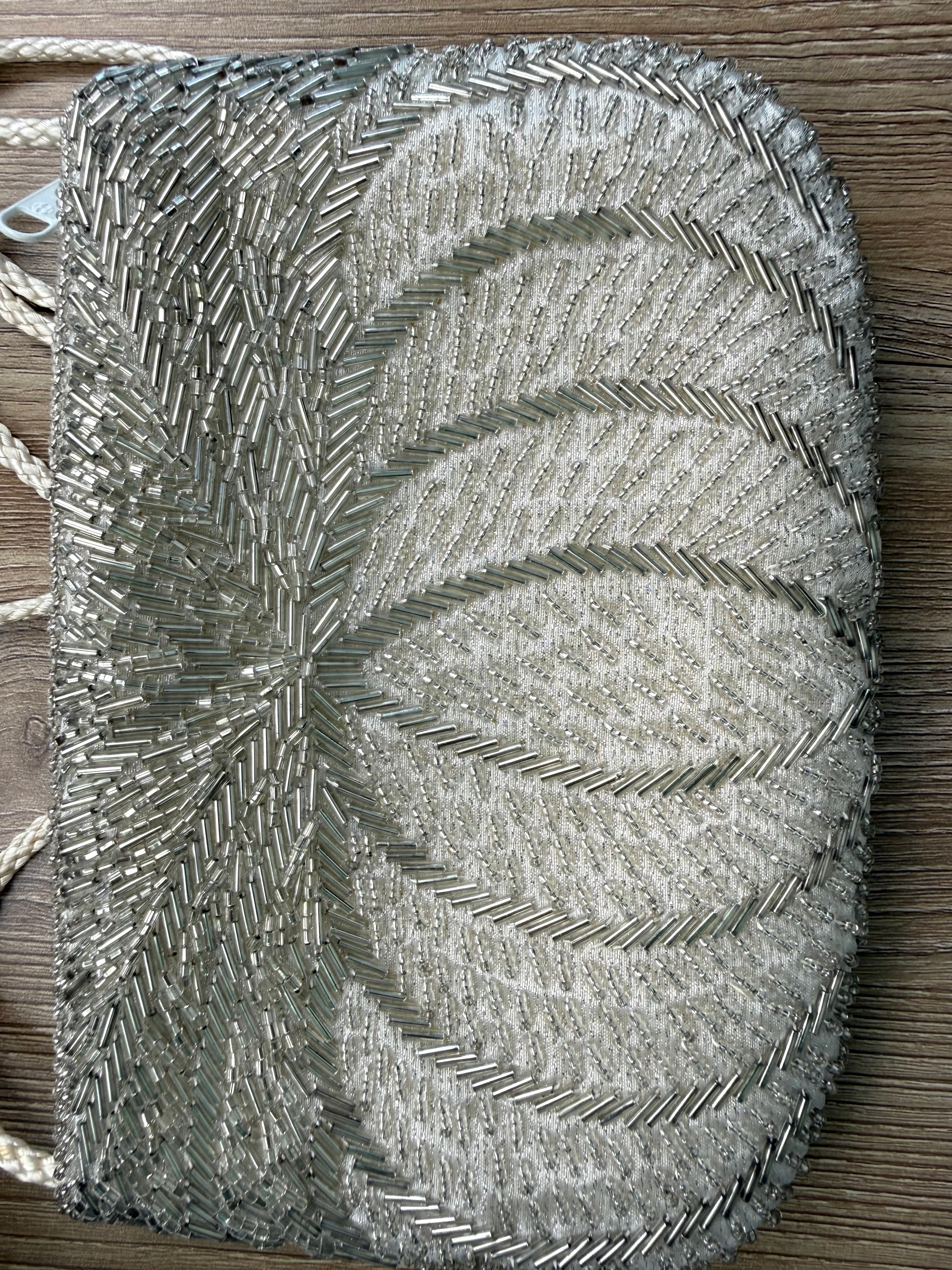 front of  Vintage Silver Beaded Evening Bag at Blue Sparrow Shop Resale Reimagined  