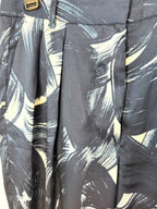 front pleats and pocket detail on Banana Republic wide leg patterned pants