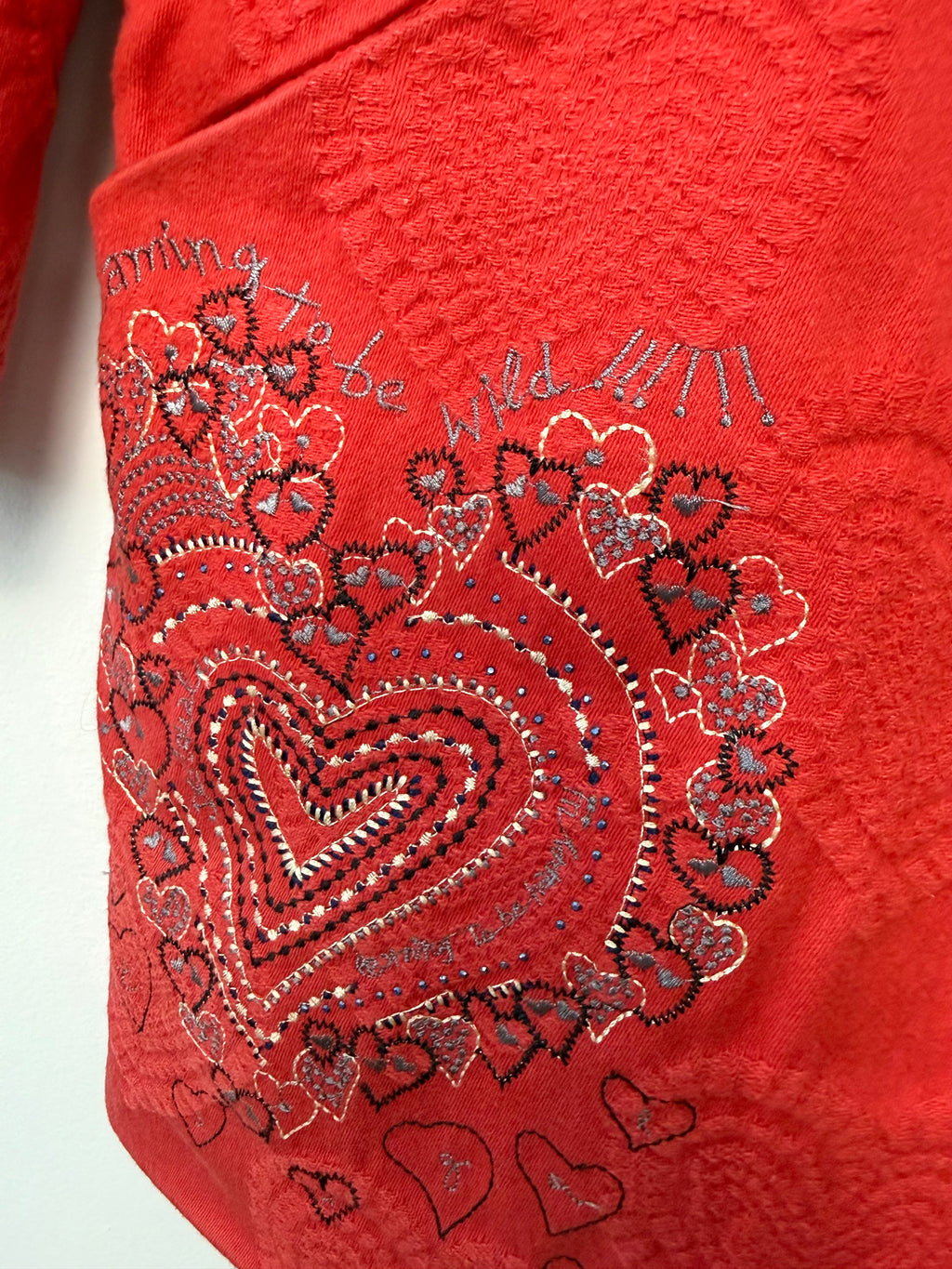 front pocket design on Desigual red jacket
