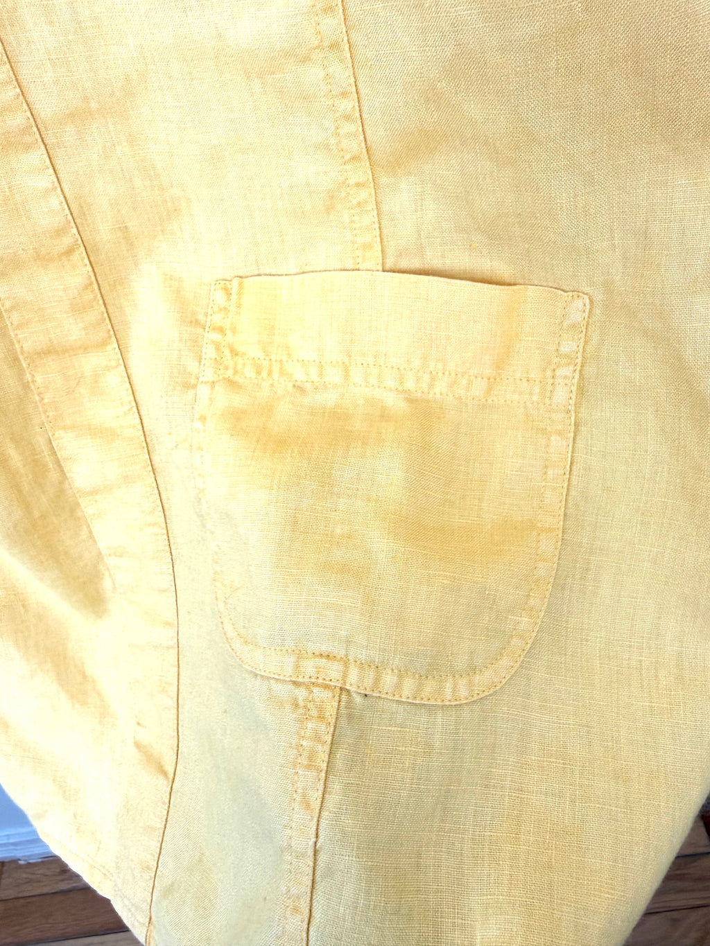 front pocket detail at hem of Natural fiber linen shirt slow fashion neutral styling essential