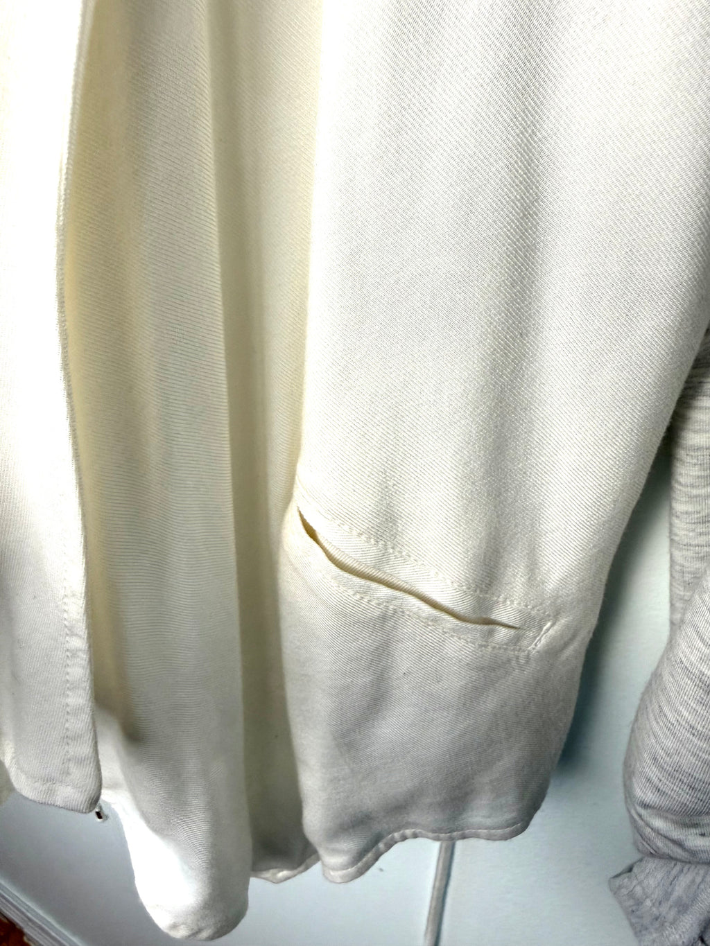 front pocket detail on Dolce Vita drape cardigan
