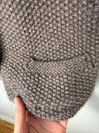front pocket detail on Handmade Chunky knit Button-Front Vest at Blue Sparrow Shop