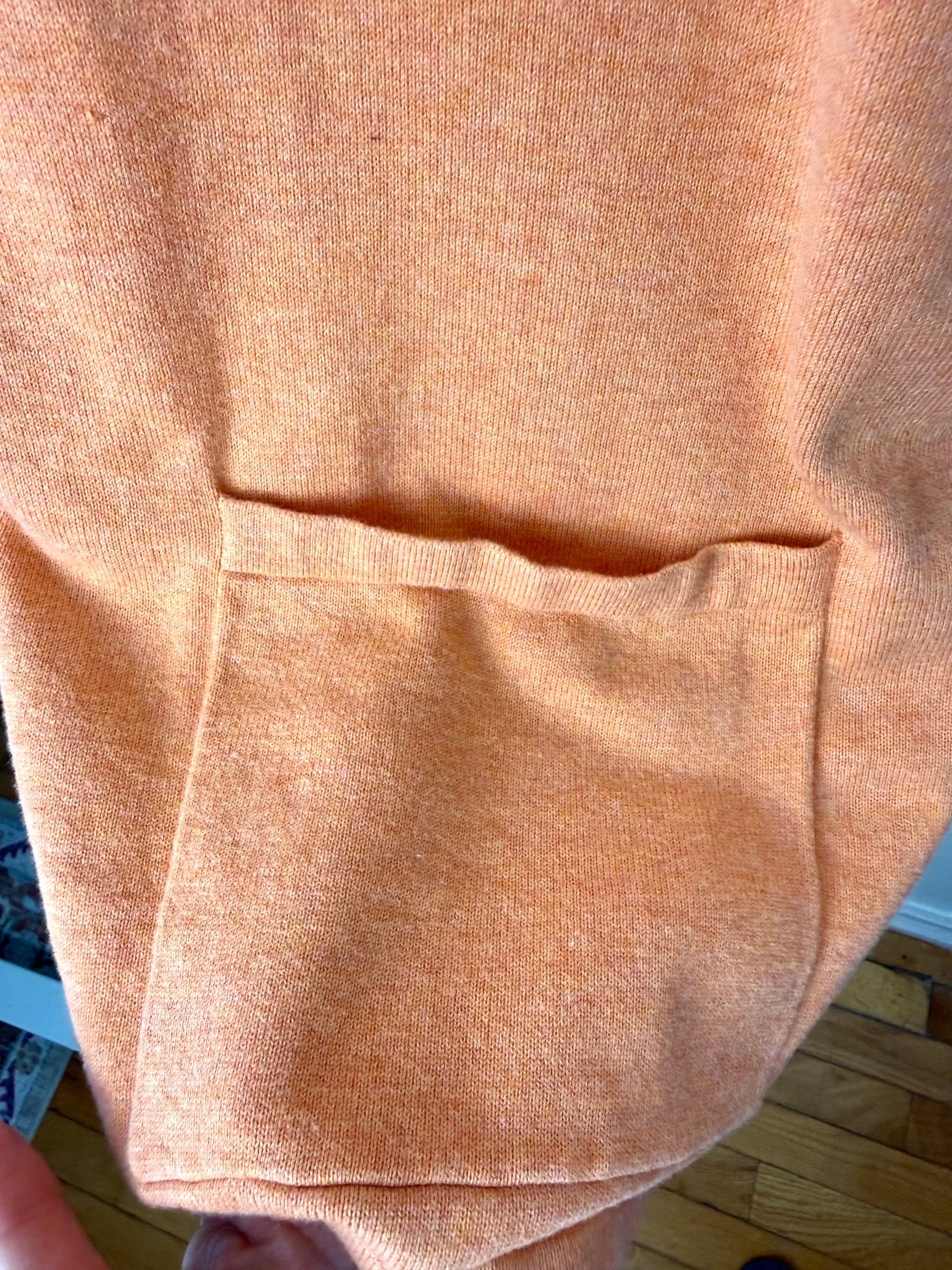 front pocket detail on Marble UK brand knit kimono shawl or lightweight cardigan in peach 