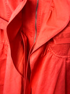 front ruffle detail on THX Merci Collection ruffle trench coat jacket