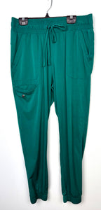 green healing hands scrub pants on hanger
