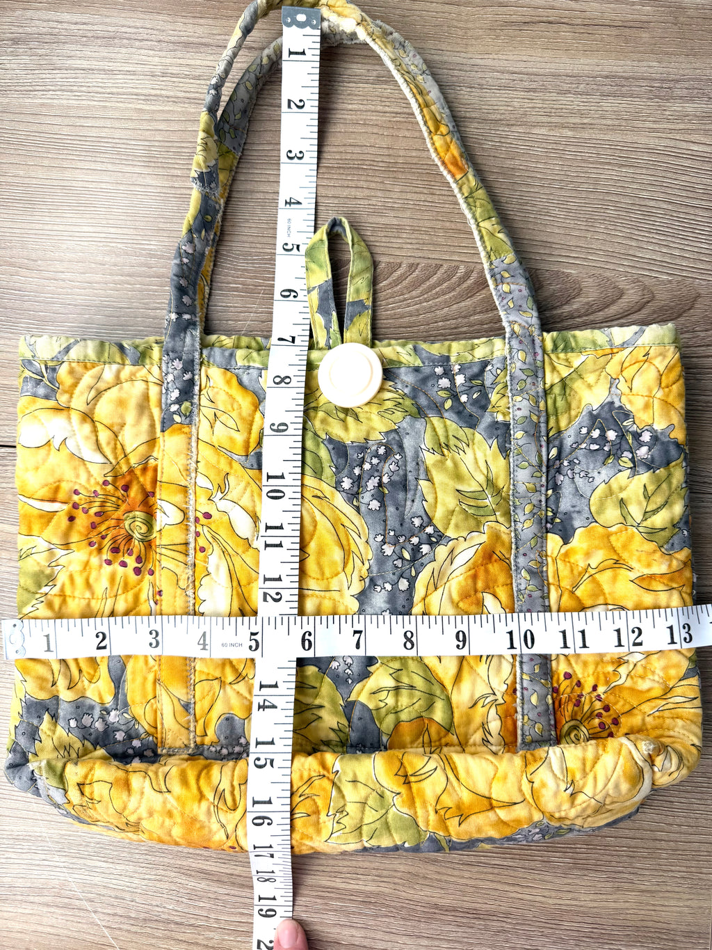 handmade artisan quilted cotton bag measuring 13" wide and 10" deep with 7" handles 