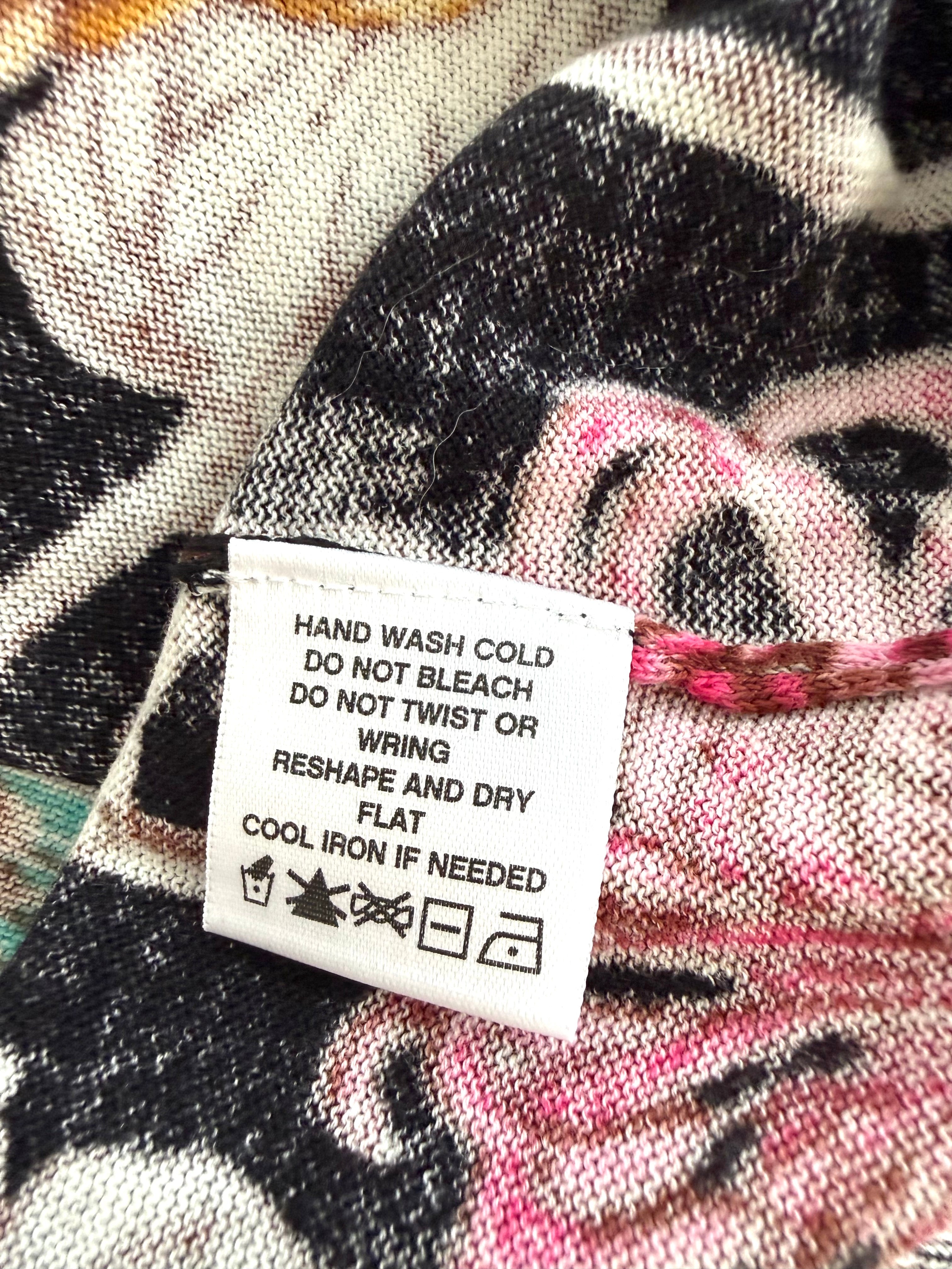 hang tag inside NWT floral Lord & Taylor cardigan with care instructions