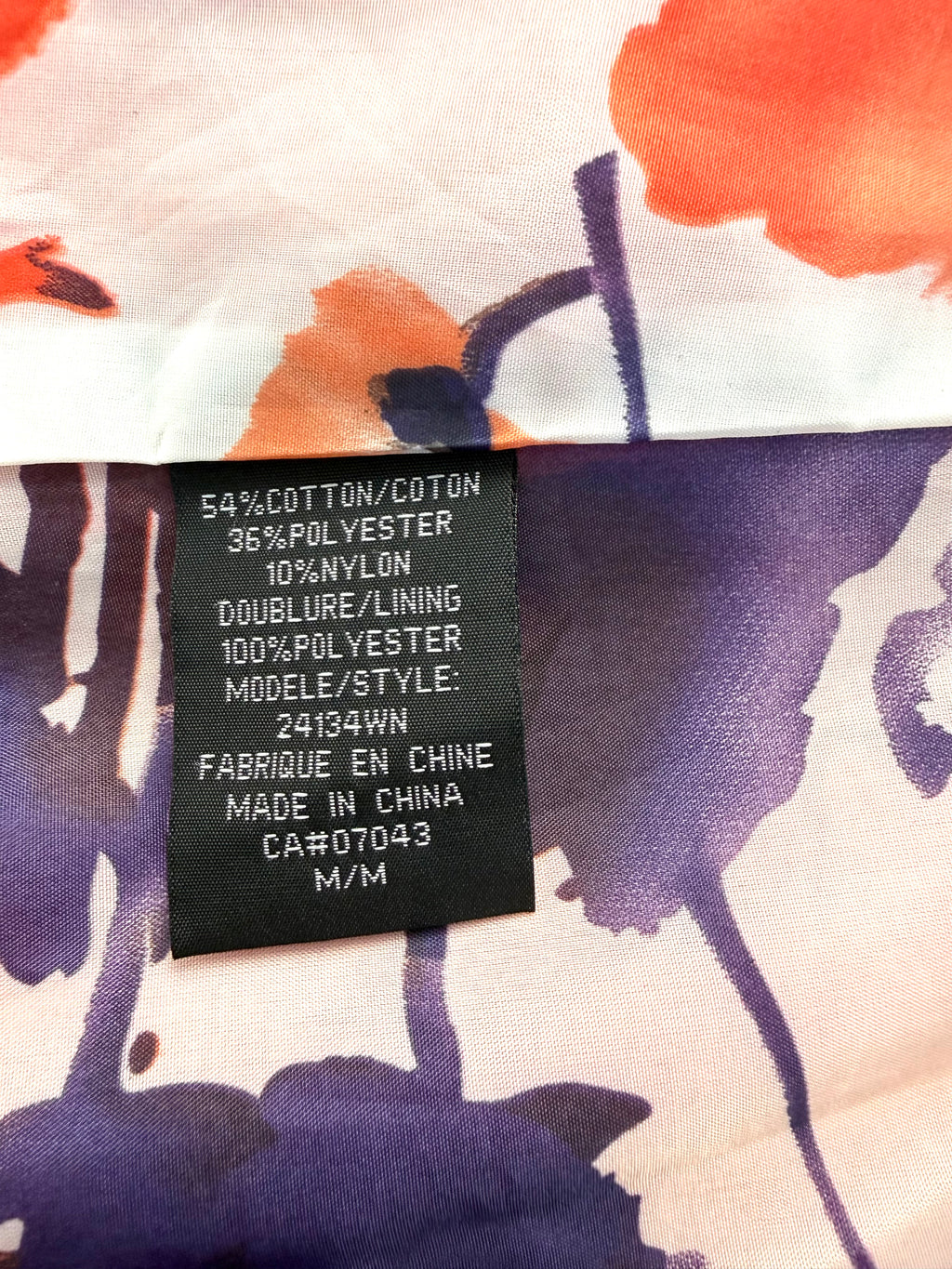 hang tag inside THX Merci Collection ruffle trench coat jacket