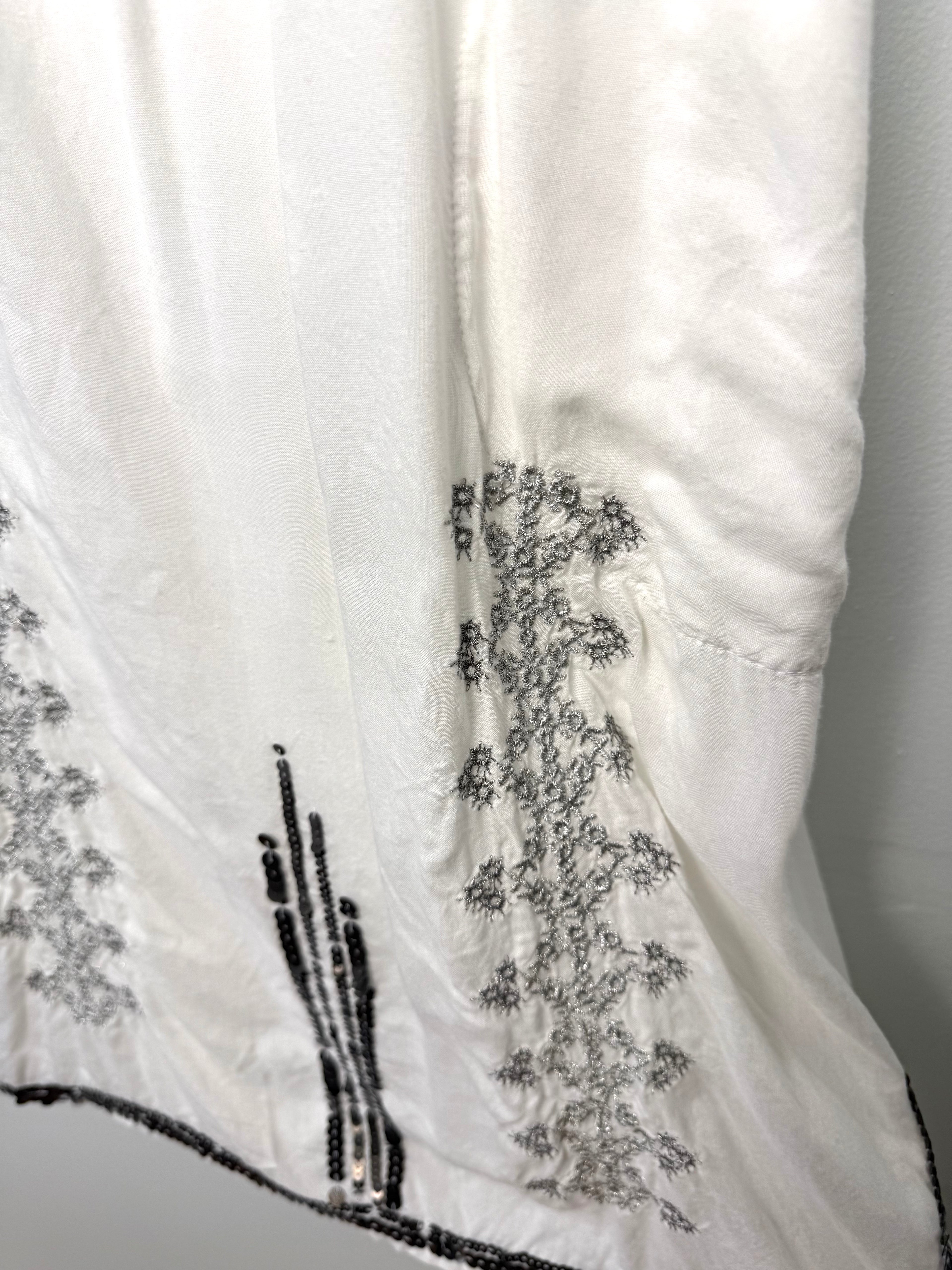 hem detail on Kalypso7 Embroidered Boho Tunic Dress