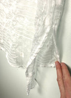 hem detail on Picadilly Canada Textured Sheer Top 