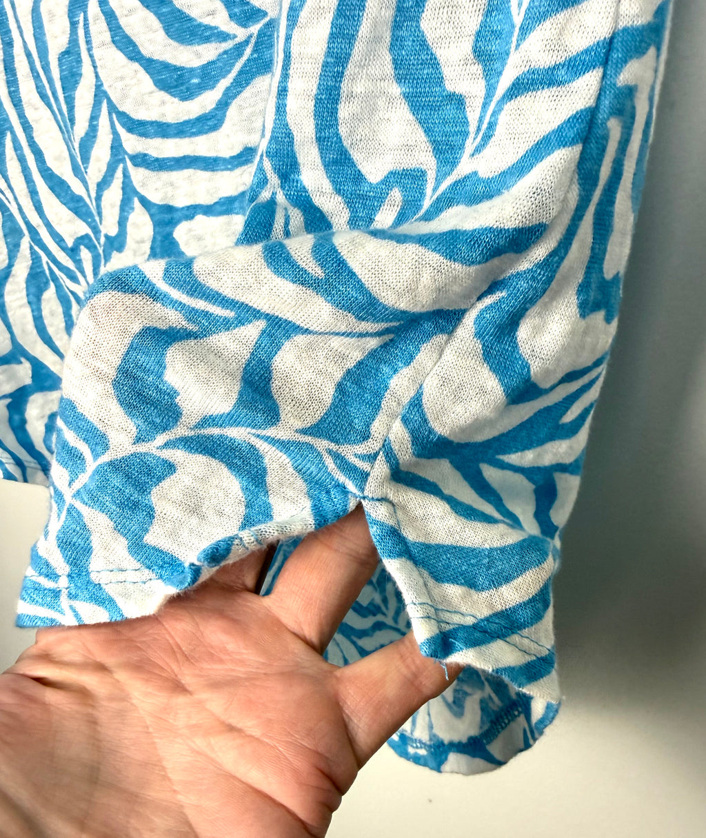 hem detail on Tahari 100% linen botanical print top