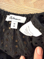 inside fabric tags on Reitmans 100% Cotton Black Eyelet Puff Sleeve Top — Square Neck | Peasant Style | Size M at Blue Sparrow Shop Resale Reimagined 