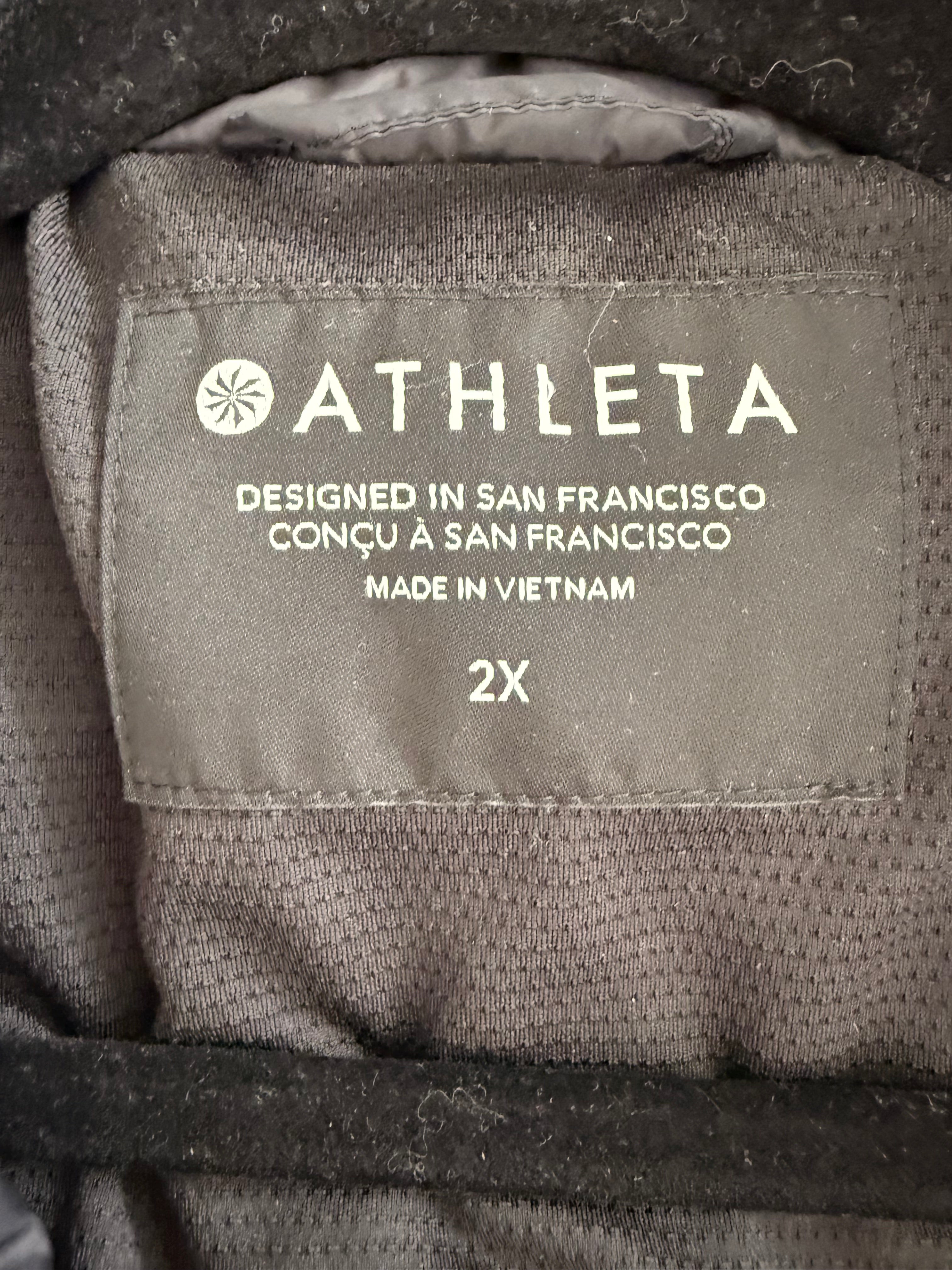 inside label on Athleta Rock Ridge PrimaLoft Insulated Vest in Black  Size XXL 