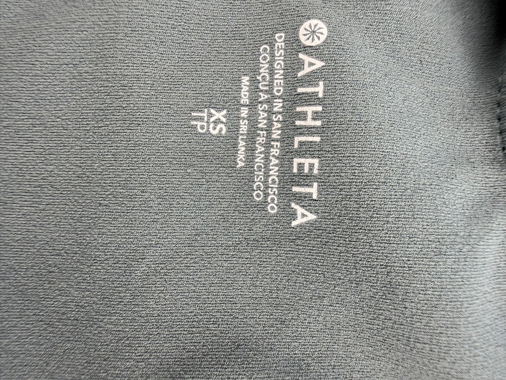 inside label imprinted on Athleta tie dye  Sports Bra Crop Top