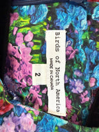 inside label on Birds of North America floral romper with impressionist hydrangea print