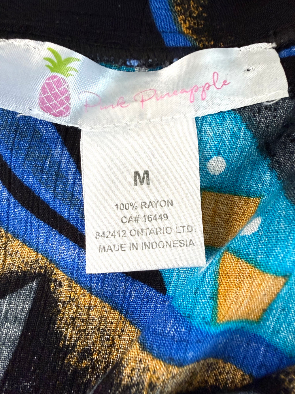 inside label on Bold Geometric Print Open Kimono Cardigan | Size M at Blue Sparrow Shop 