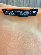 inside label on  Deep V Neck Zara peach dress with batwing sleeve fully lined  